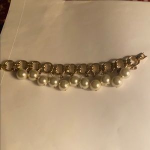 Gold loop bracelet with dangling pearls